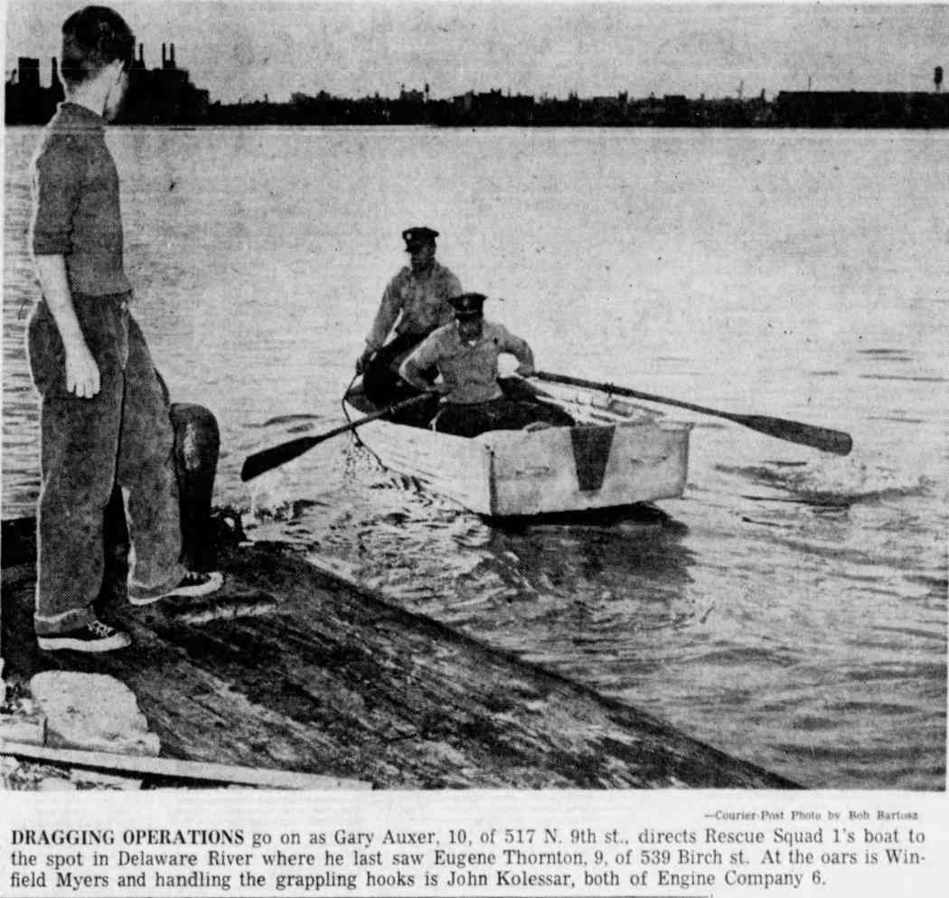 Dragging operations in the Delaware River as Gary Auxer directs Rescue Squad 1's boat, May 10, 1962