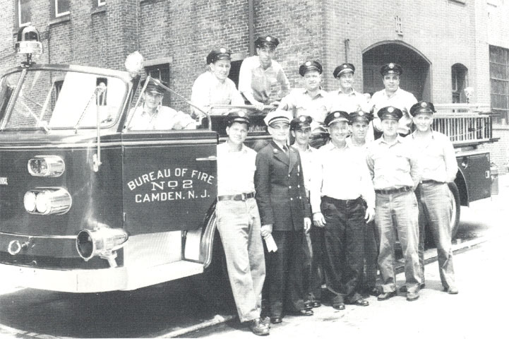 Engine Company 2 with new pumper in front of quarters, 1960