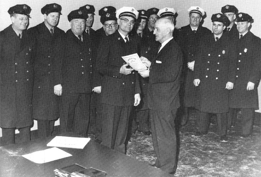 Commissioner presents proclamation to Chief McDowell, January 1961