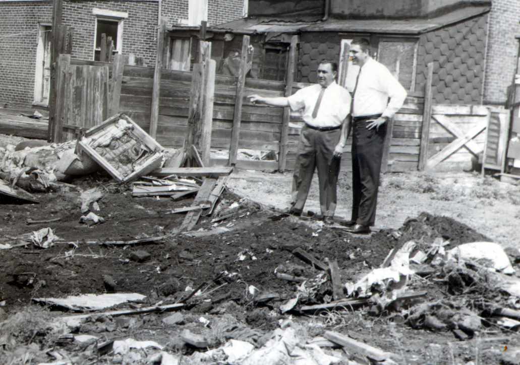 Spring Clean Up Week held in City of Camden N.J. May 23-28 1966 — Director of Public Safety Keith Kauffman and Mr. A. Scappa sizing up vacant littered lot