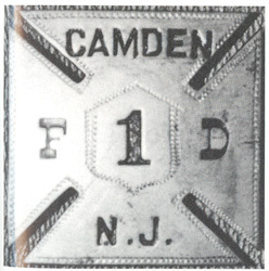 First style of breast badge worn by members of the Camden career fire department, 1869