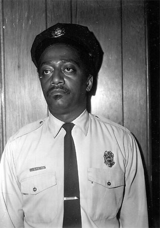 Portrait of George M. Jackson in fire department uniform