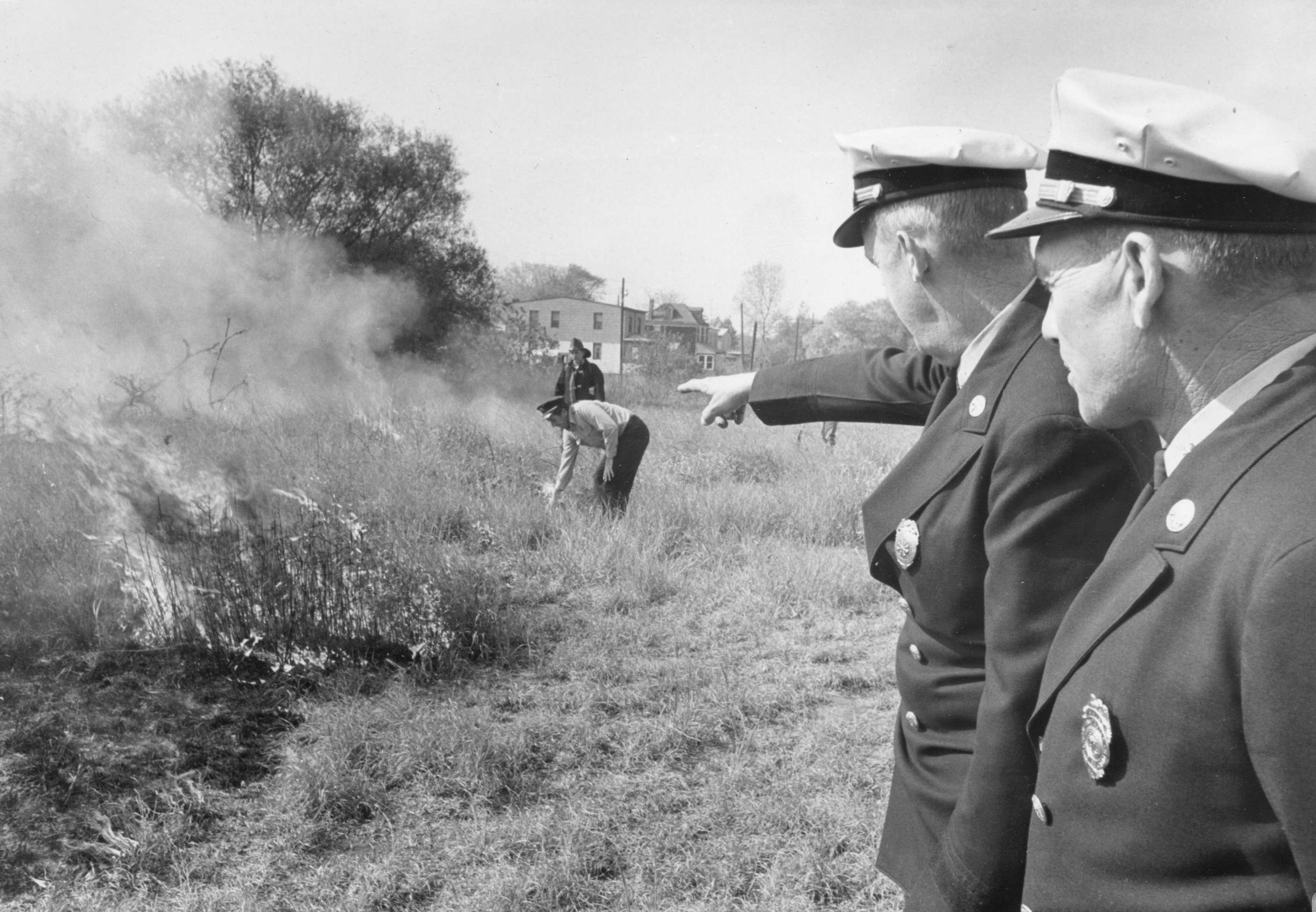 Controlled burn of swamp land 1964 at foot of North 36th Street and Farragut Avenue — Godfrey Patterson, George Baxter, Bob Bartosz