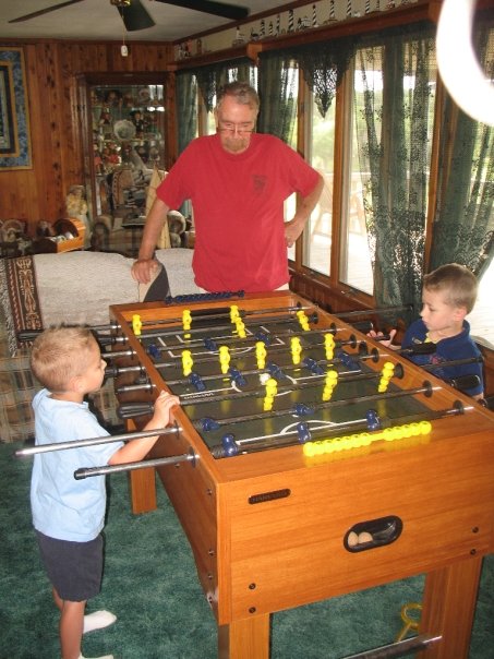 Joe Gallagher and the men playing Foosball