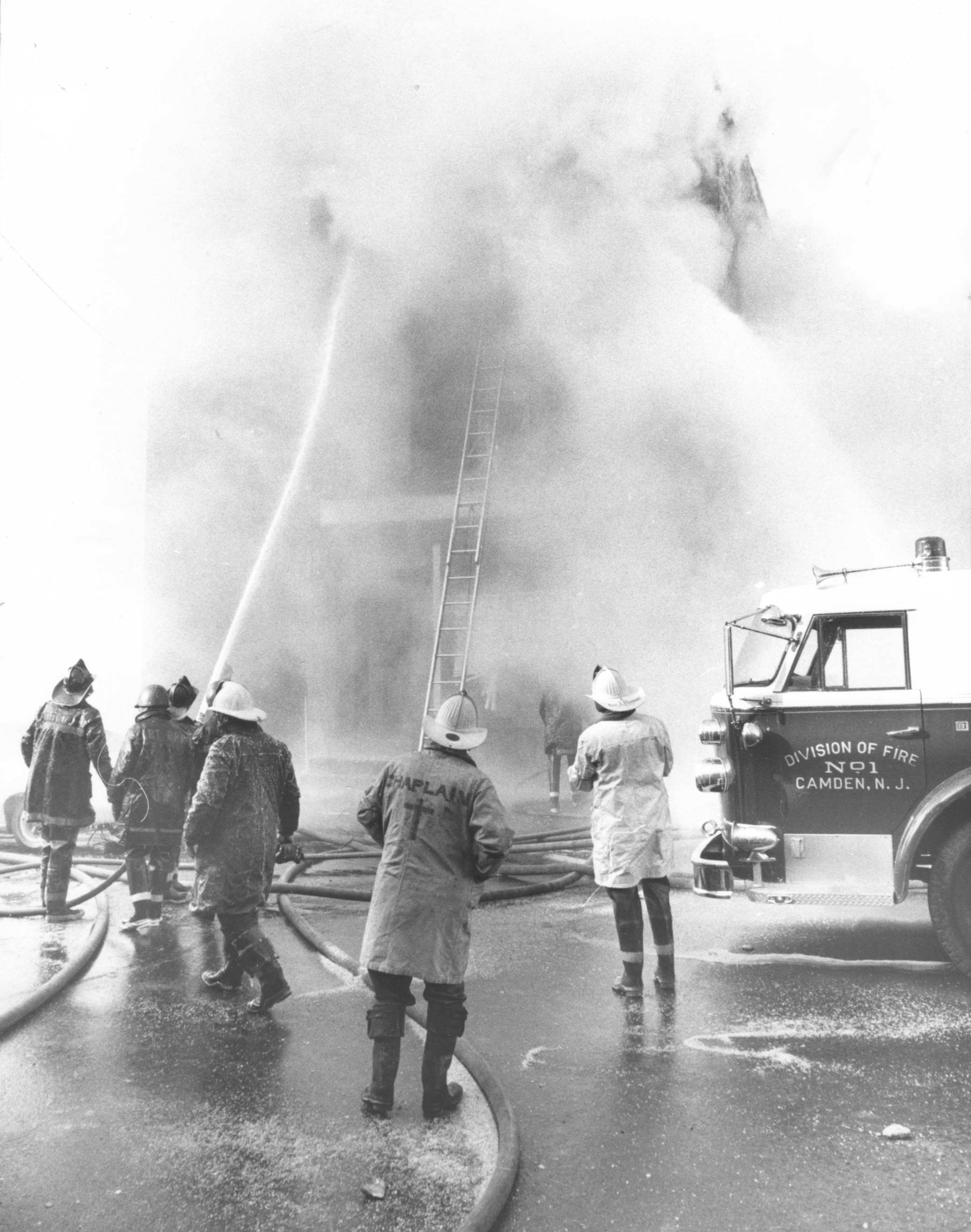 Firefighters battling three-alarm blaze at 813 S. 5th Street, South Camden, February 1974