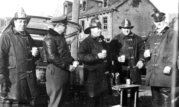 Fire Canteen Unit and members of Engine Company 7 after a general alarm fire on December 14, 1959
