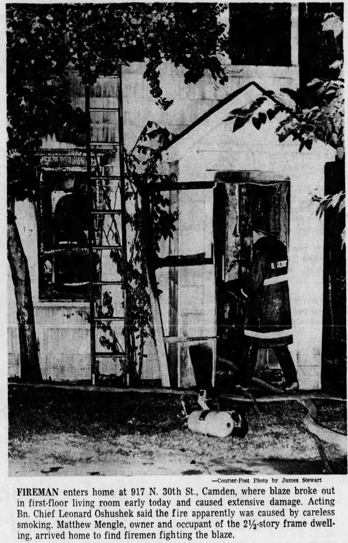 Fireman enters home on North 30th Street, Camden, 1968