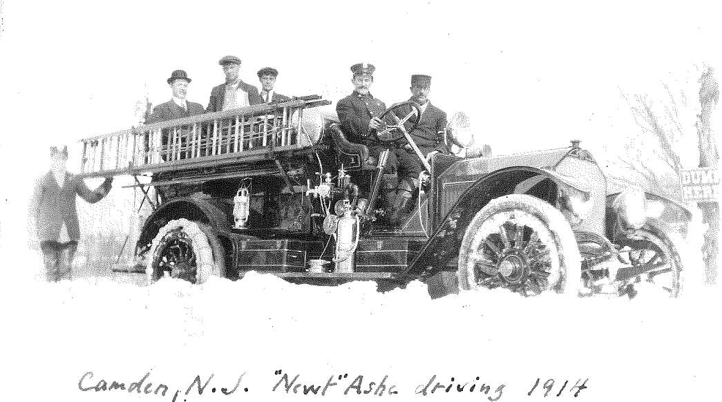 Newton Ash with the Camden Fire Department's first motorized pumper, 1914 American LaFrance