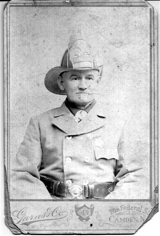 William A.H. White in his fire department uniform. Studio portrait by Garns & Co., 305 Federal Street, Camden.