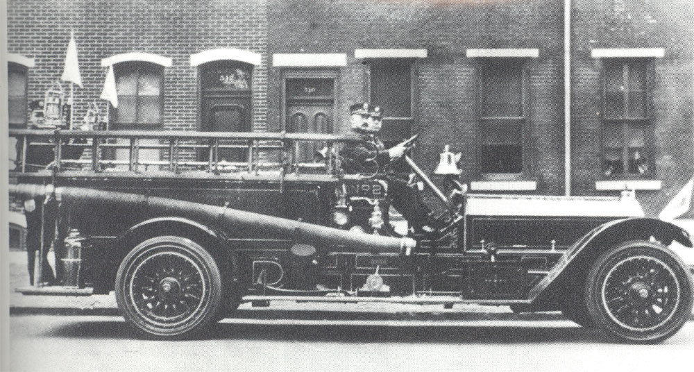 Newton Ash and Lt. James White with the 1916 Boyd 2-in-1 pumper at Engine Company 2