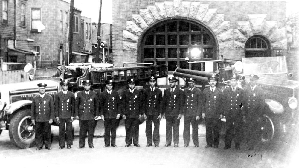 Engine Company 1 wagon and pumper at front of quarters, South 4th and Pine Streets, circa 1949
