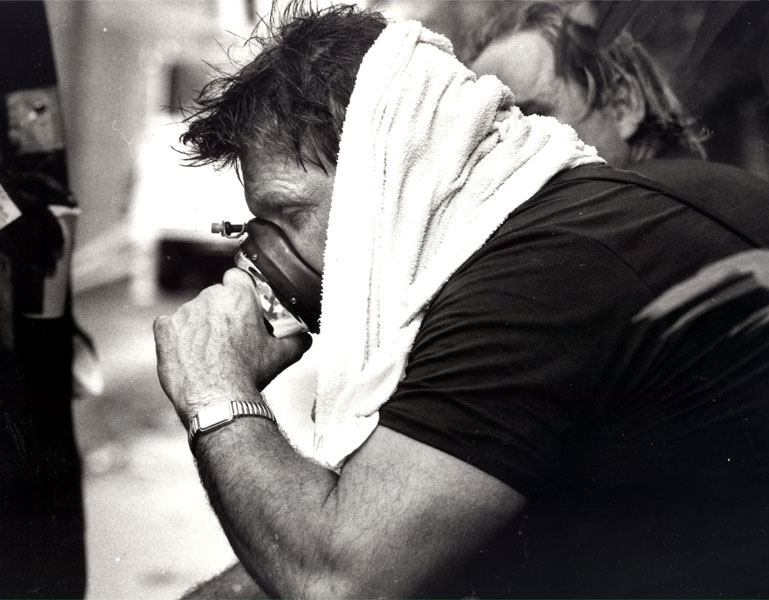 Camden Fire Department Captain Herb Leary getting oxygen after fire at 501-519 Jackson Street, June 30, 1990