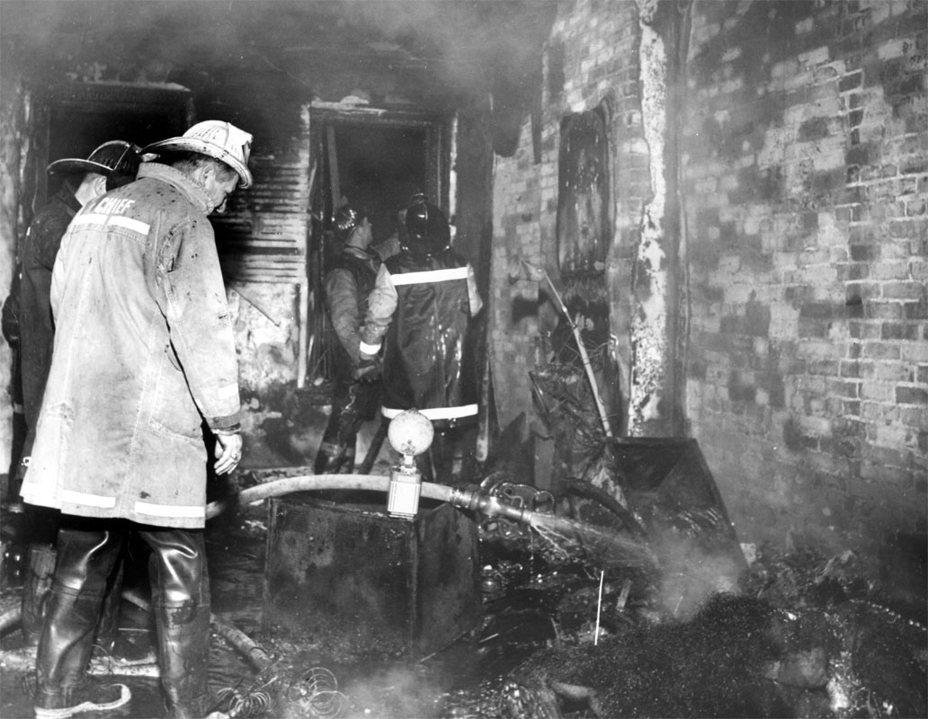 Chief Michalak in first floor of house where three children were killed at the Poet's Row fire, August 23 1972