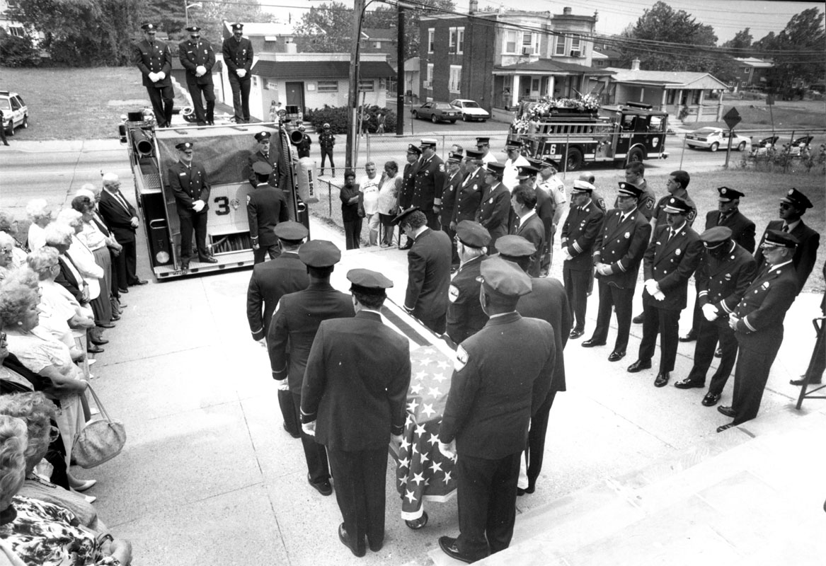Contingent of officers and members attend the funeral of Chief Edward Michalak at Saint Anthony of Padua R.C. Church, 1994