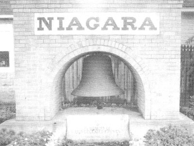 Memorial dedicated to the deceased members of the Niagara Fire Company of Merchantville, New Jersey, featuring the bell from the Weccacoe Engine Company No. 2 tower in Camden
