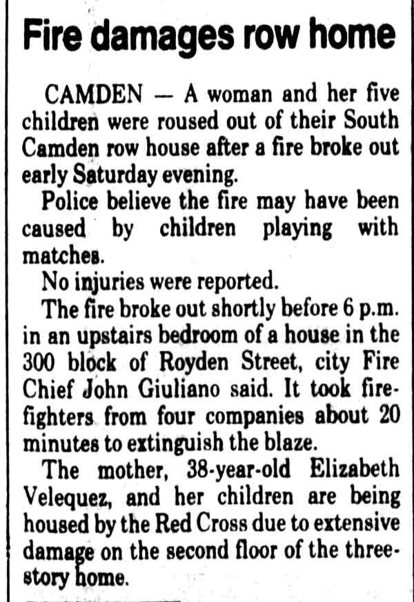Fire damages row home on Royden Street, South Camden, April 12, 1982