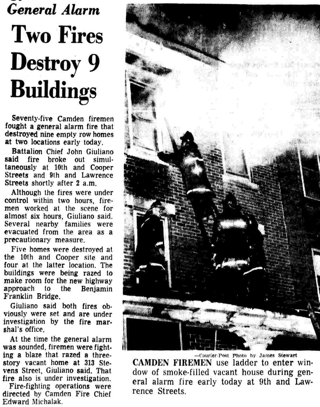 Camden firemen use ladder to enter window of smoke-filled vacant house during general alarm fire at 9th and Lawrence Streets, May 20, 1967