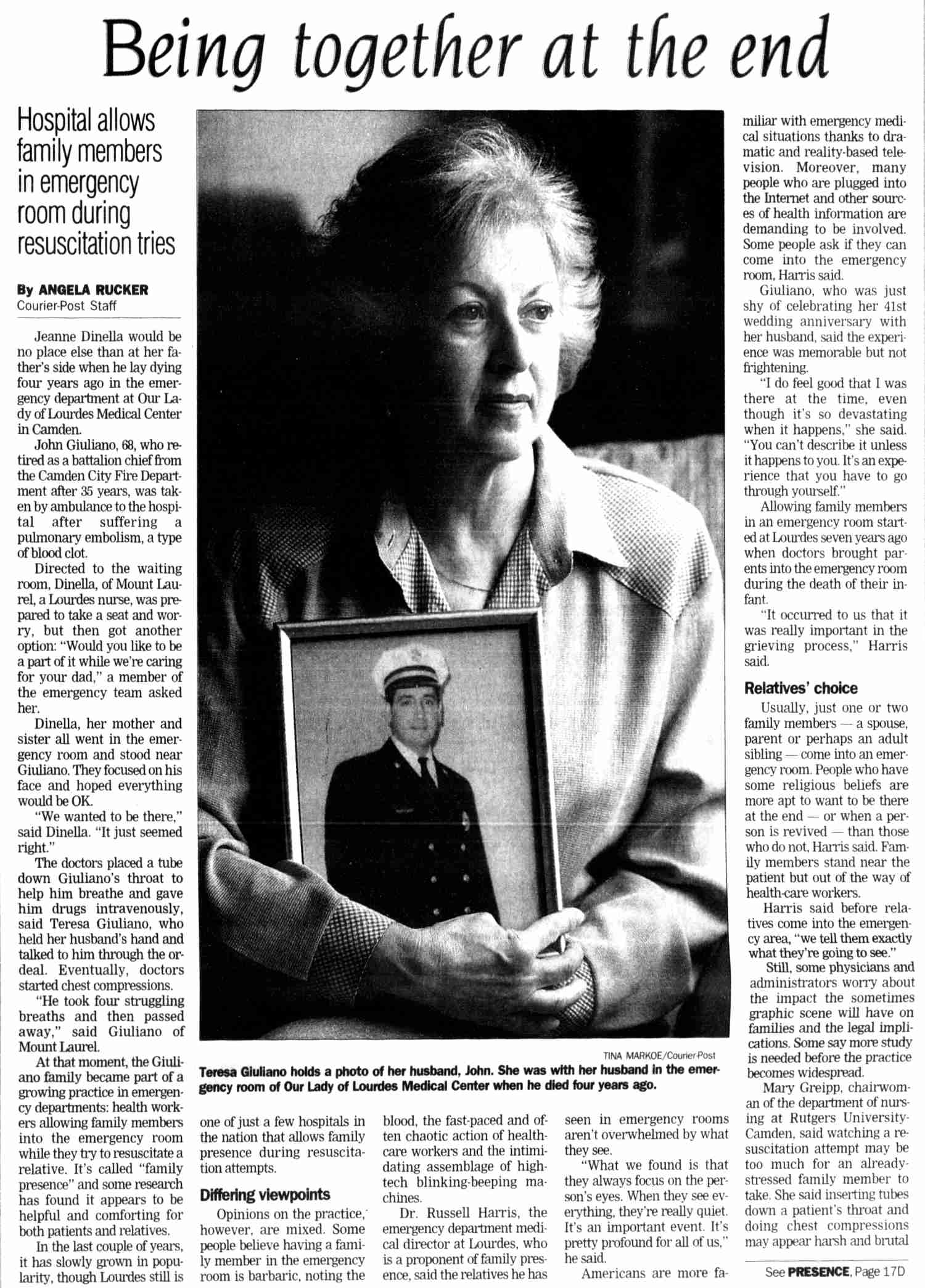 Teresa Giuliano holds a photo of her husband John — article on family presence in emergency rooms, Our Lady of Lourdes Medical Center, May 2000