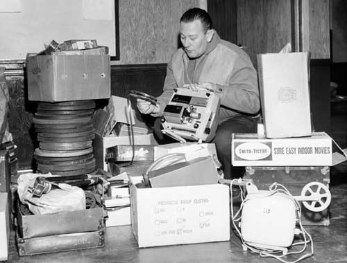 Lieutenant Bill Neale at a burglary scene, 1959