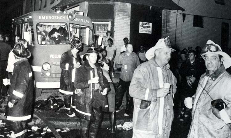 Fire chief and deputy chief with canteen members