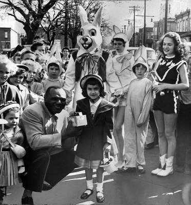 Jersey Joe Walcott at North Camden Easter parade — with Edward Wicker and Mary Topolewski as Mr. and Mrs. Easter Bunny