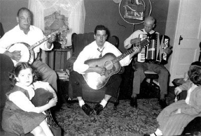 Clifford Tydeman on banjo, Douglas Tydeman on guitar, Vincent A. Tydeman on accordion