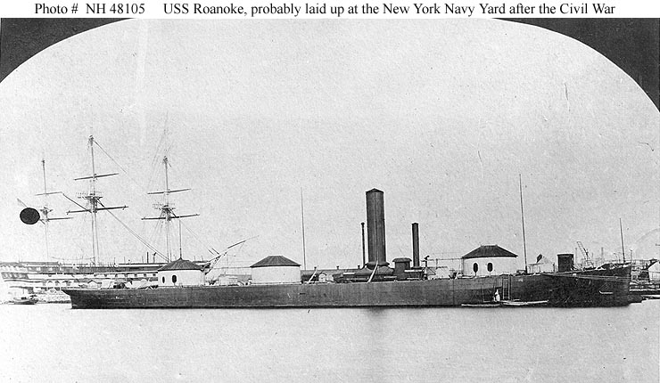 USS Roanoke at the New York Navy Yard, Brooklyn, probably following decommissioning in June 1865. The ship of the line in the left background is USS Vermont, which served as receiving ship at the Navy Yard until September 1865.