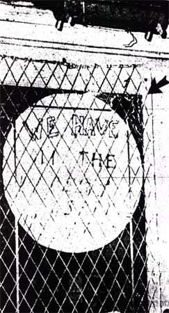 Bullet hole in door of Roxy's Record Shop, 541 Mount Vernon Street, South Camden, July 1967