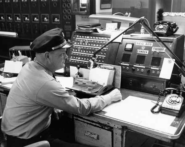 Captain Philip Farrow at the Camden Fire Department Fire Alarm Radio Room, City Hall, 1967