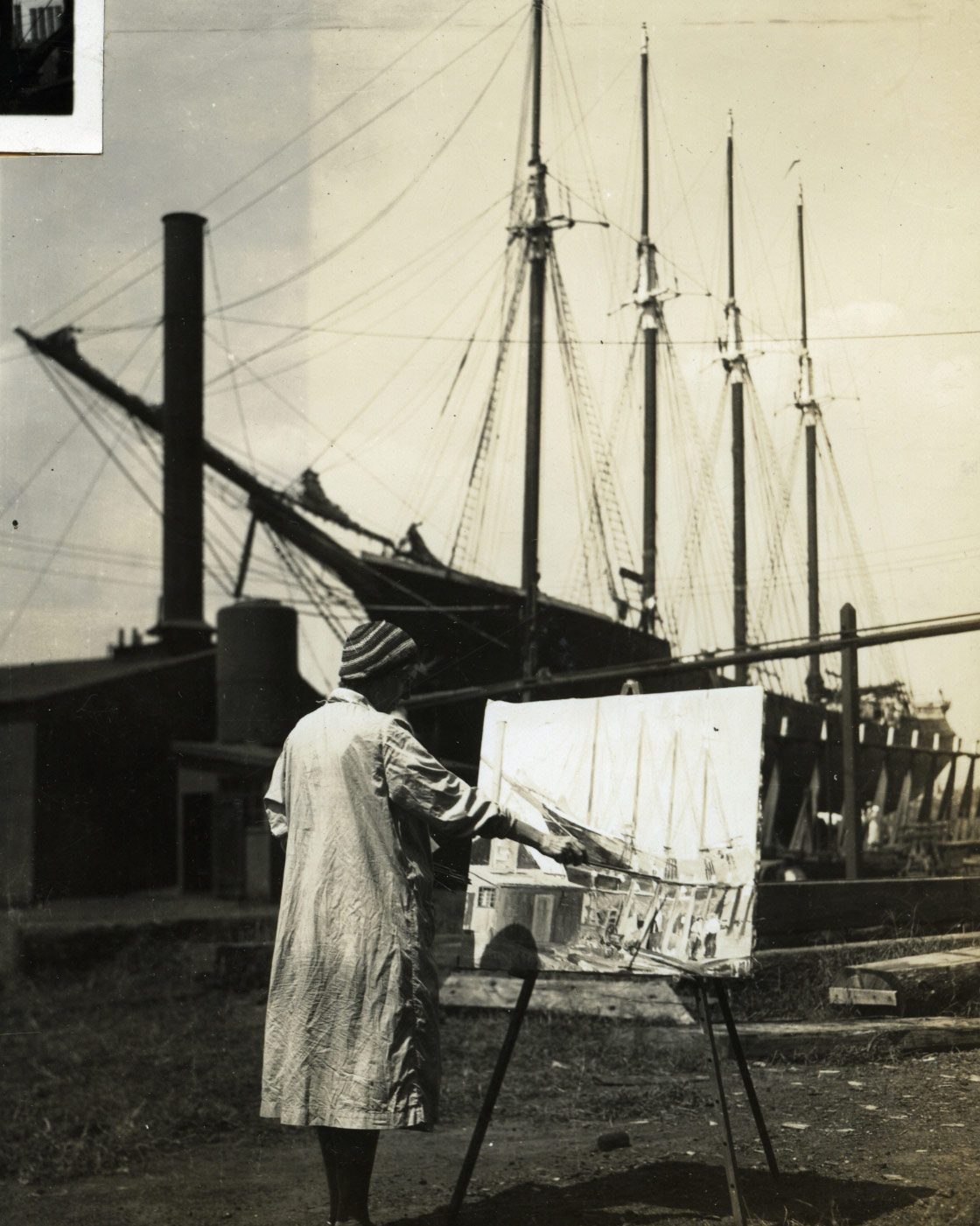 Florence V. Cannon painting at the North Camden shipyard, full photograph