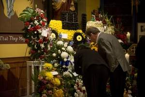 Mourners pay their respects to Joe Balzano at his viewing Monday