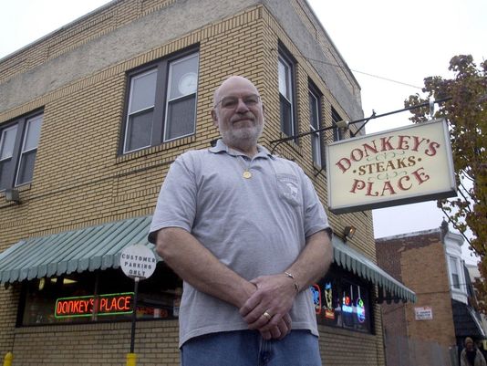 Bob Lucas stands in front of Donkey's Place
