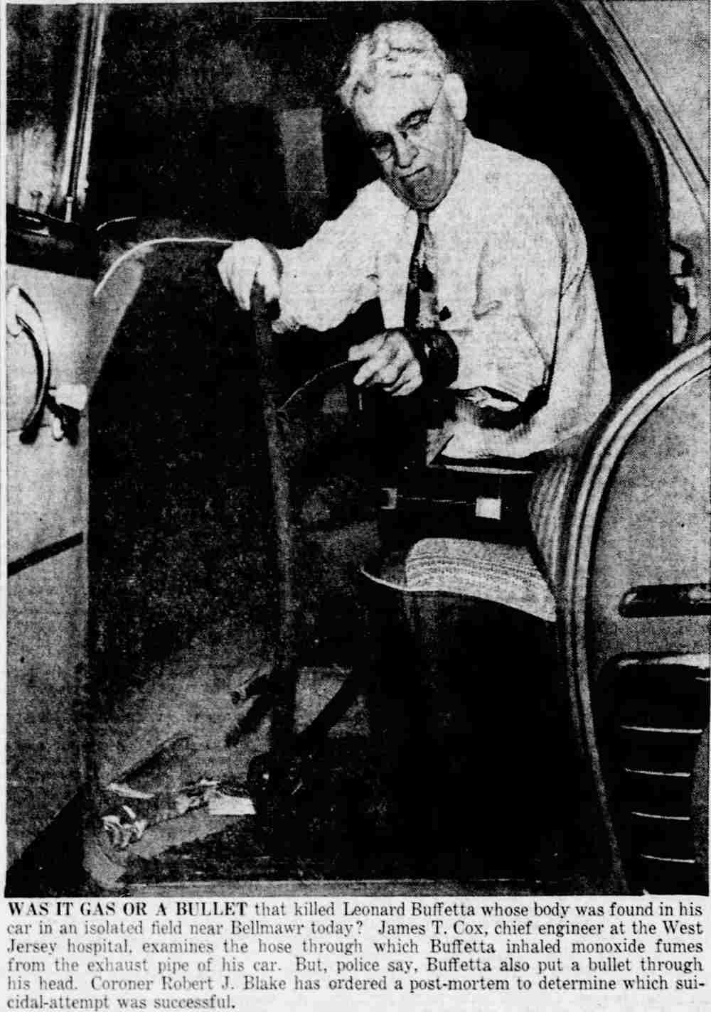 James T. Cox examines the exhaust hose in Buffetta's car