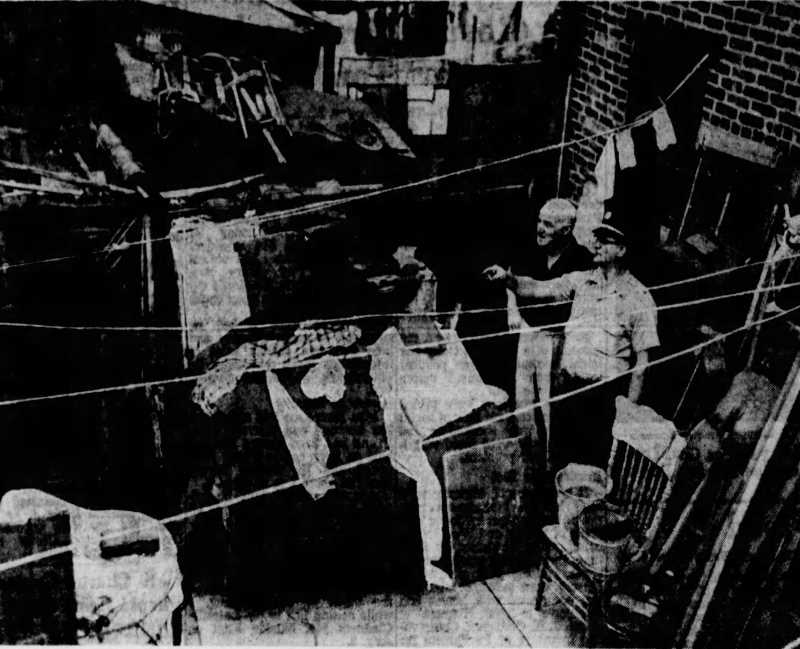 Commissioner Garrity and Health Inspector Leo Tompkins inspect condemned property at 423 Liberty Street