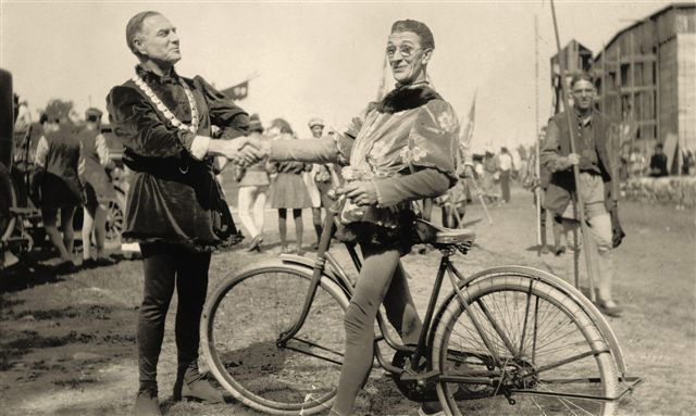 Johnny Dooley on a bicycle on the set of When Knighthood Was in Flower, 1922
