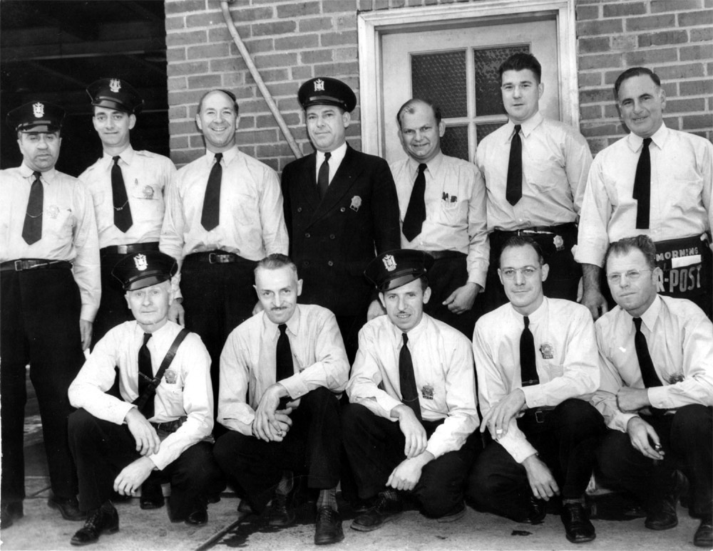 Gus Gondolf and co-workers at the N.J. Auto Inspection Station, 1140 Wright Avenue