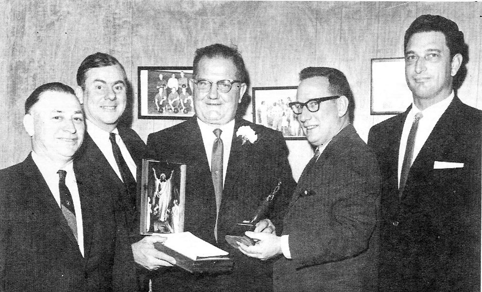 James J. Cusick Sr. at his 1966 retirement dinner at the ICAC, with Mayor Alfred Pierce