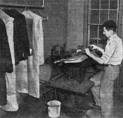The pressing room of Nick's Shoe Repair Shop, 20 Haddon Avenue, Camden, 1938
