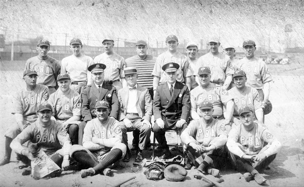 Police Benevolent Association Baseball Team, 1930s. Chief Colsey is seated, wearing police uniform, at right.