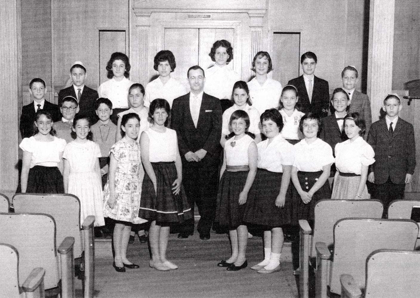 Cantor Louis Herman with school choir, June 1961