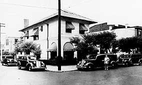 Antonio Mecca in front of The White House, 819 South 4th Street, 1930s
