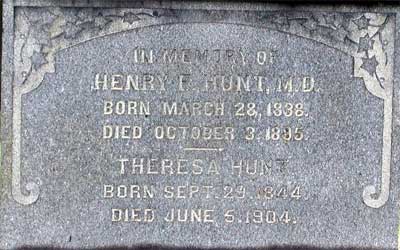 Hunt family grave marker inscription close-up — Henry F. Hunt, M.D., born March 28, 1838, died October 3, 1895; Theresa Hunt, born Sept. 29, 1844, died June 5, 1904