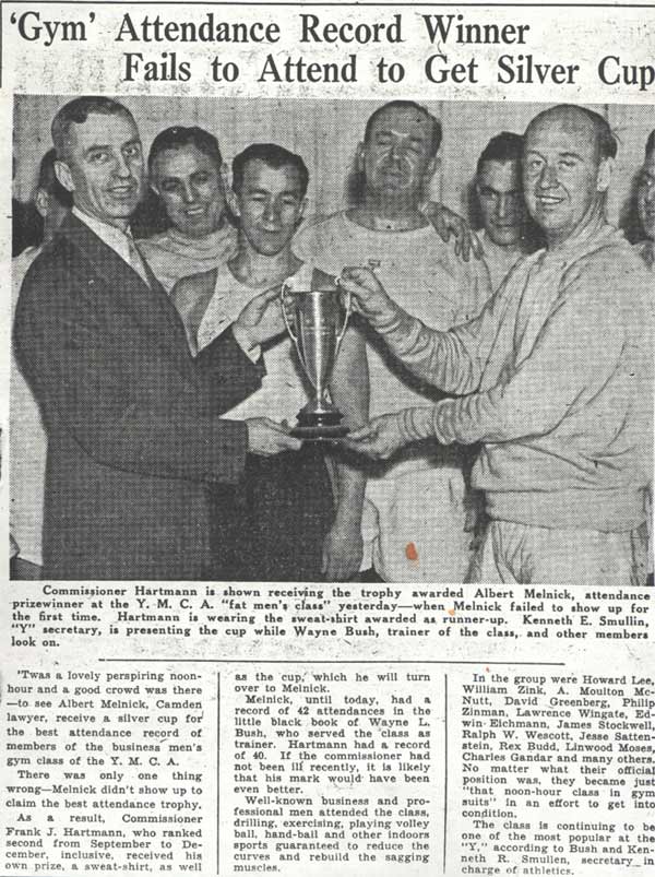 Commissioner Frank J. Hartmann Jr. receives trophy at Y.M.C.A. fat men's class, January 14, 1938. Ralph W. Wescott was among the class members.