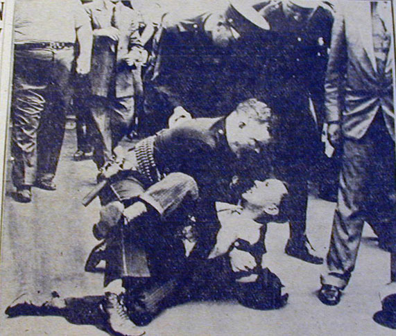 Policeman and Strike Sympathizer Put on 'Bout', Kansas City Journal-Post, July 1, 1936 — John V. Wilkie and striker during RCA strike