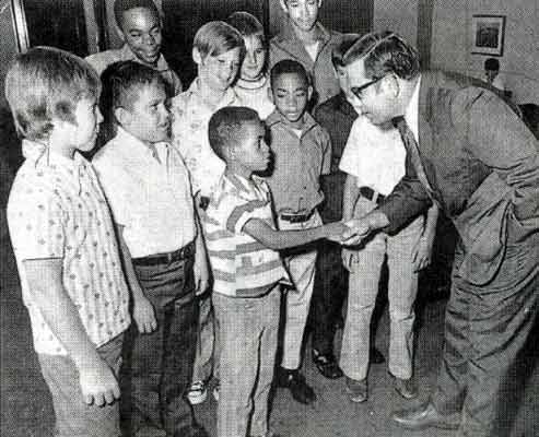 Mayor Nardi greets Danny Mohan, a playground horseshoe champion, in this 1971 photograph