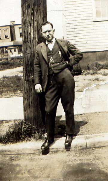 Dr. Leopold Goldstein standing on Atlantic Avenue, just west of Broadway, circa 1920