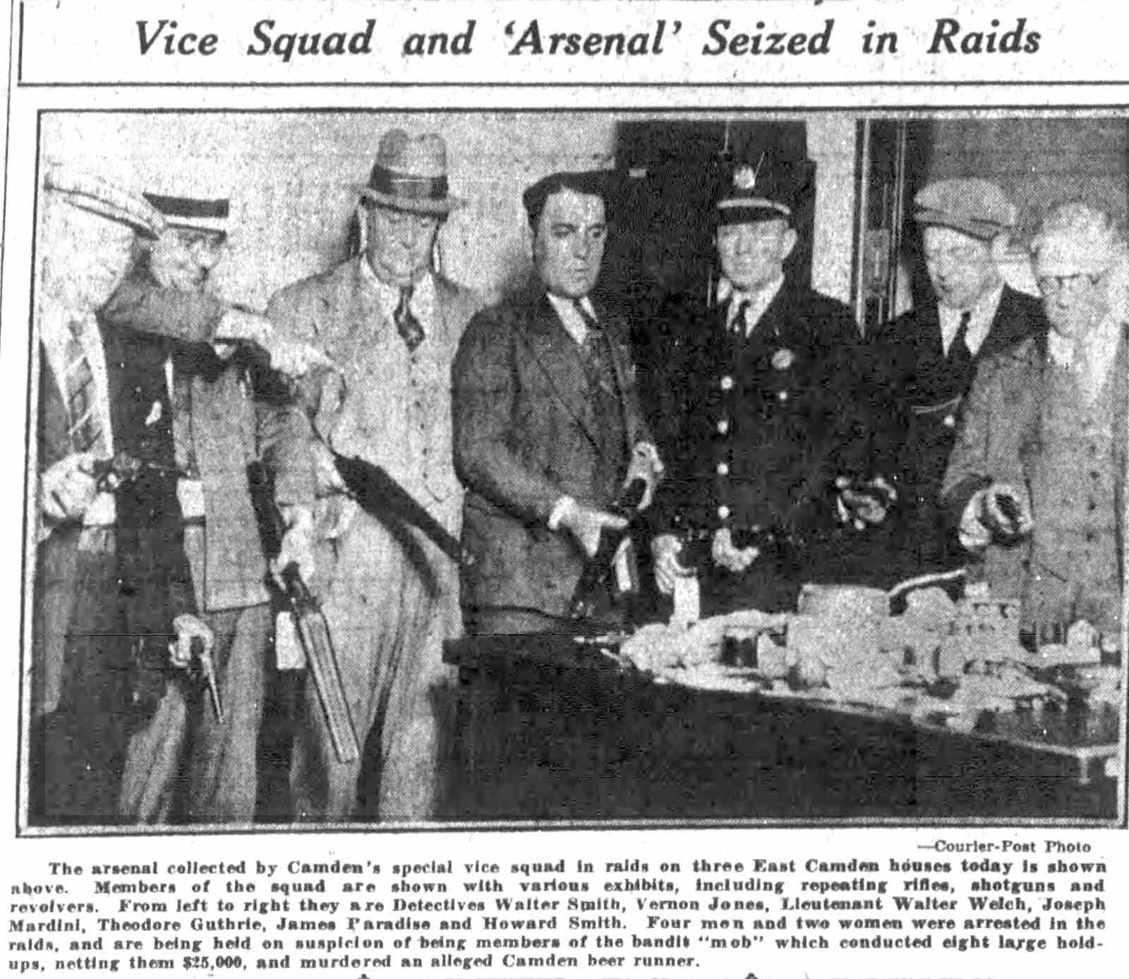 Vice squad with arsenal seized in raids, June 3, 1930