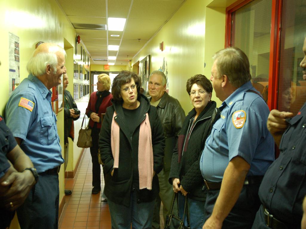 Captain Johnston with fire fighter Tartaglia's family, December 9, 2007