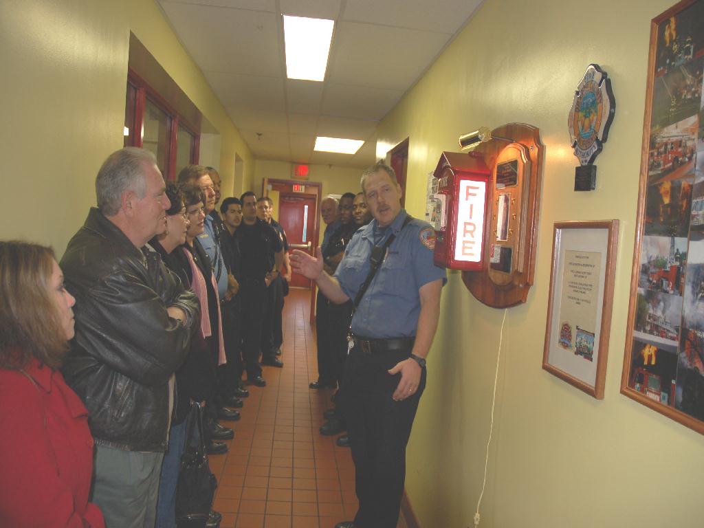 Rescue Co. 1 Captain Edward Glassman speaking with the Tartaglia family, December 9, 2007