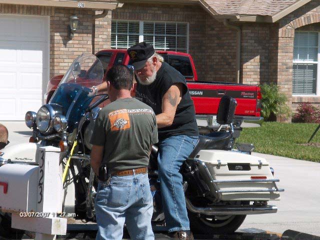 Bert and Larry loading Terry's bike for the trip back to Jersey